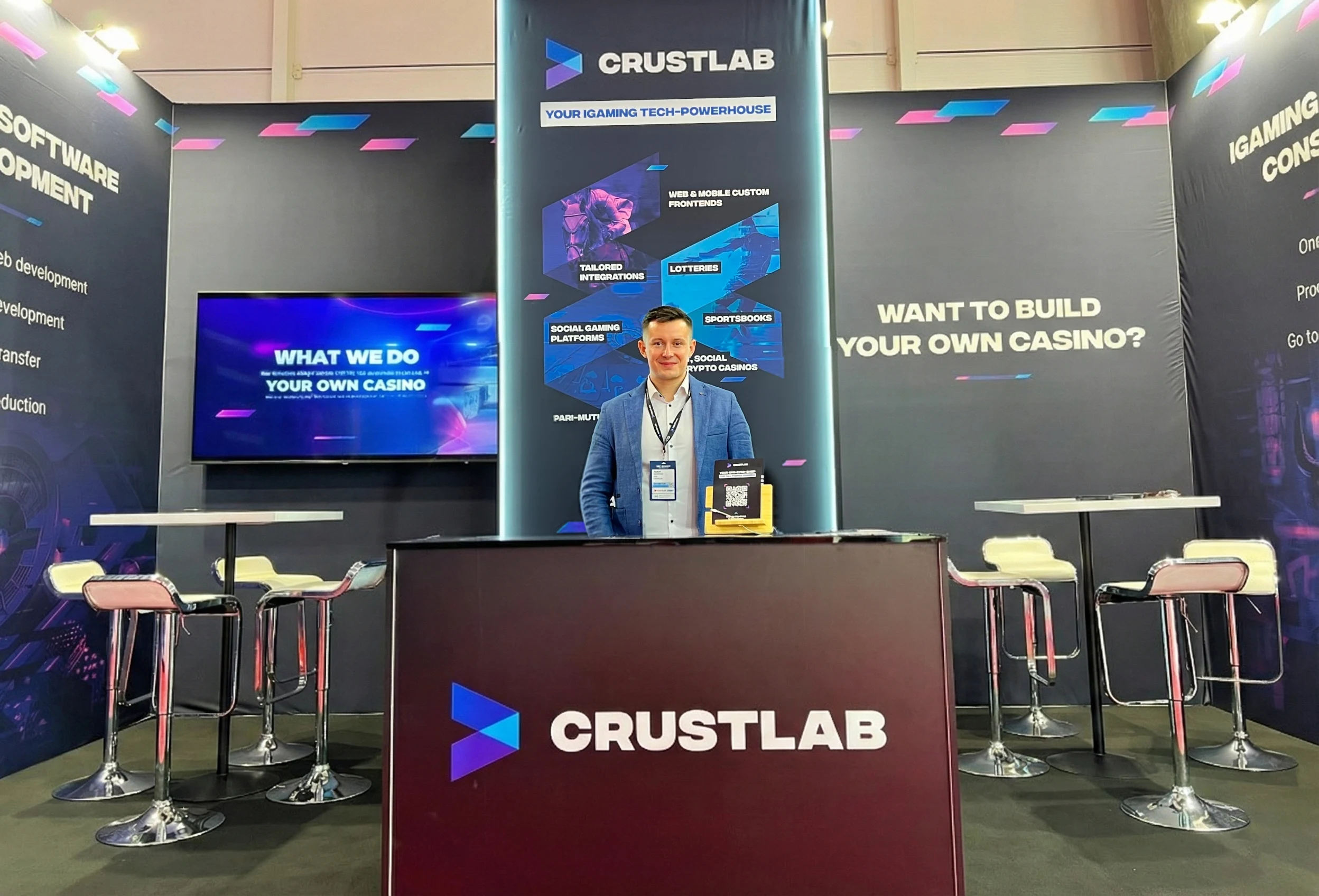 CrustLab's CEO Adam Gontarz in a trade booth at SBC Lisbon 2024